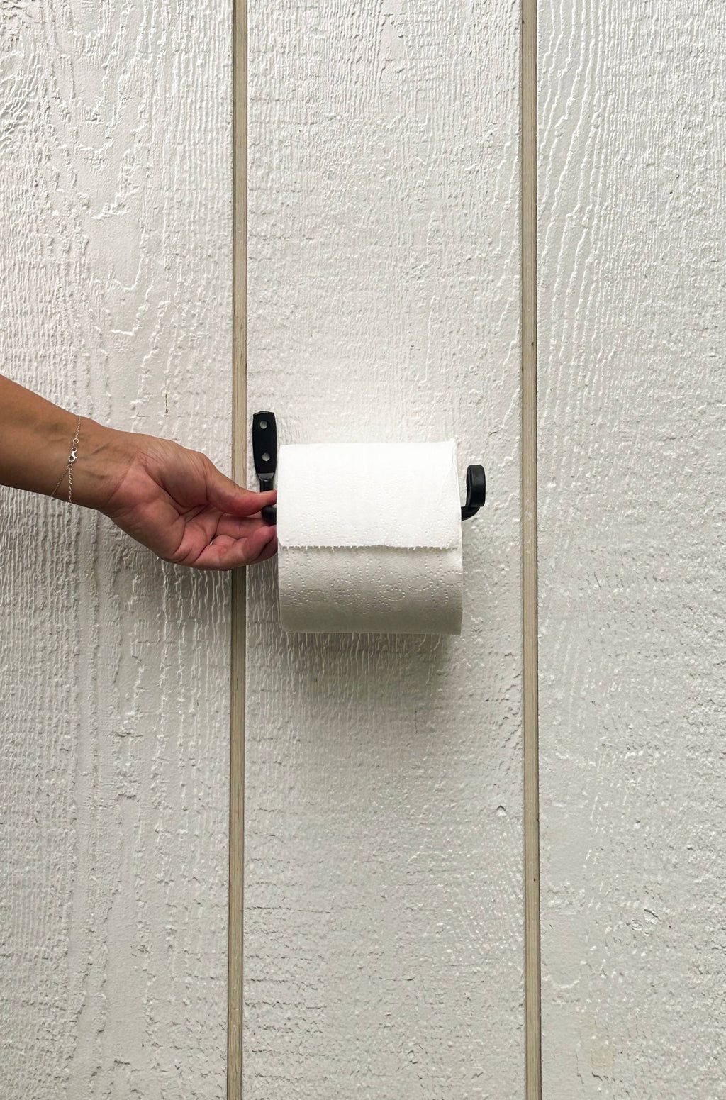 The Toilet Paper Holder