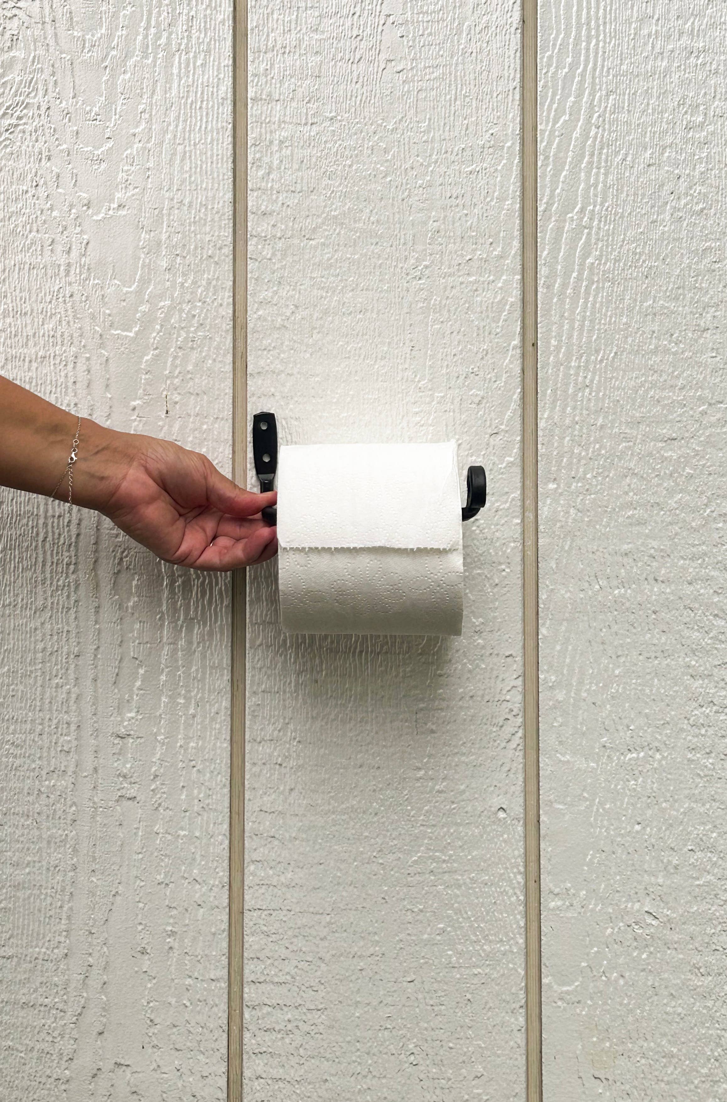 The Toilet Paper Holder