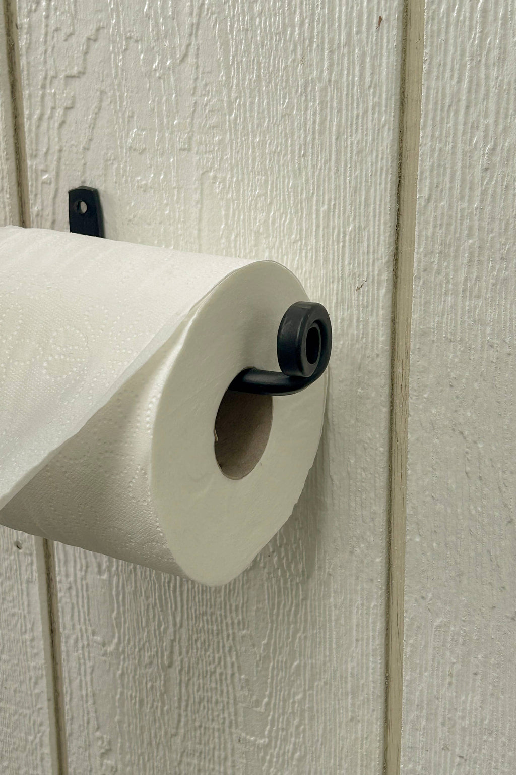 The Toilet Paper Holder