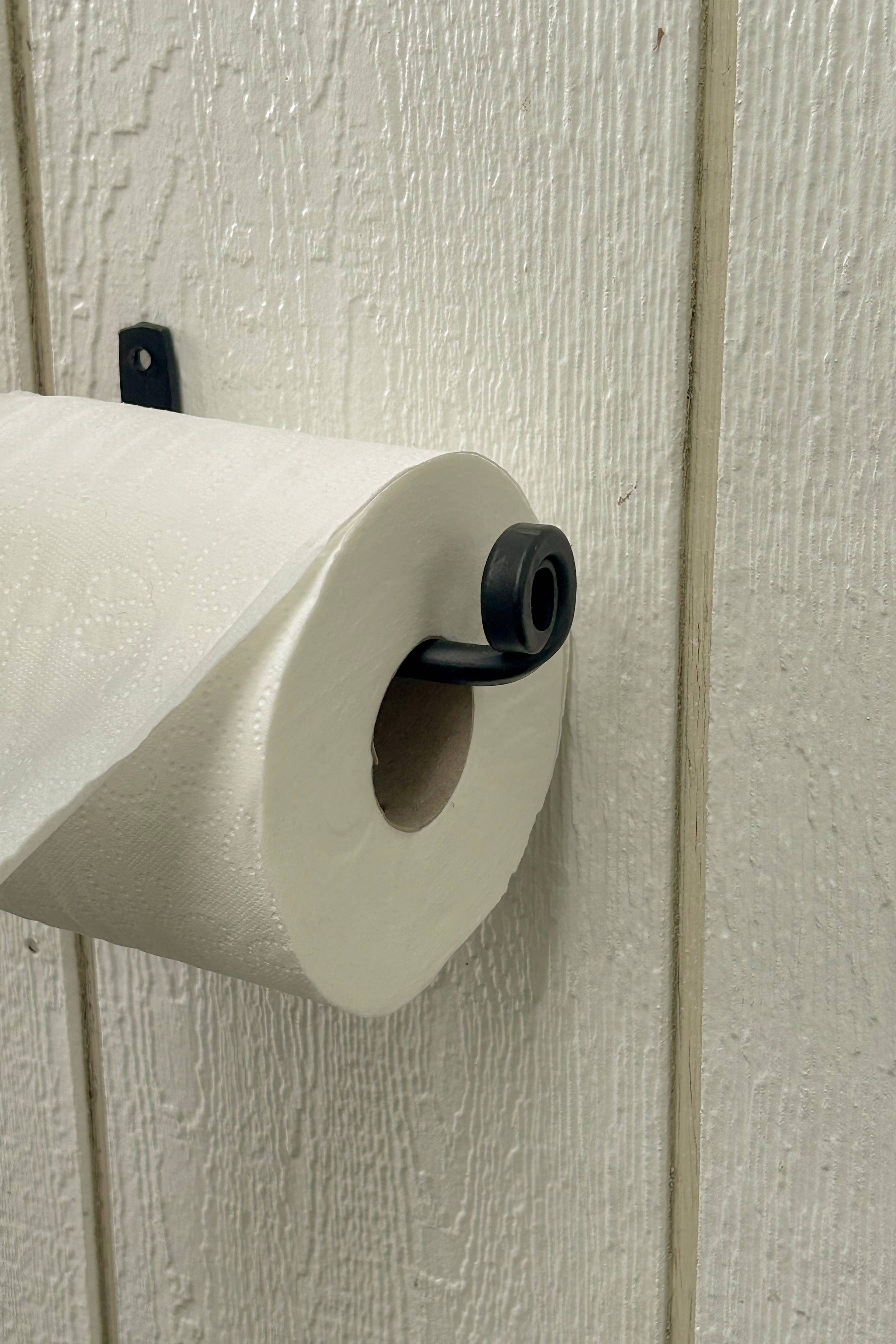 The Toilet Paper Holder