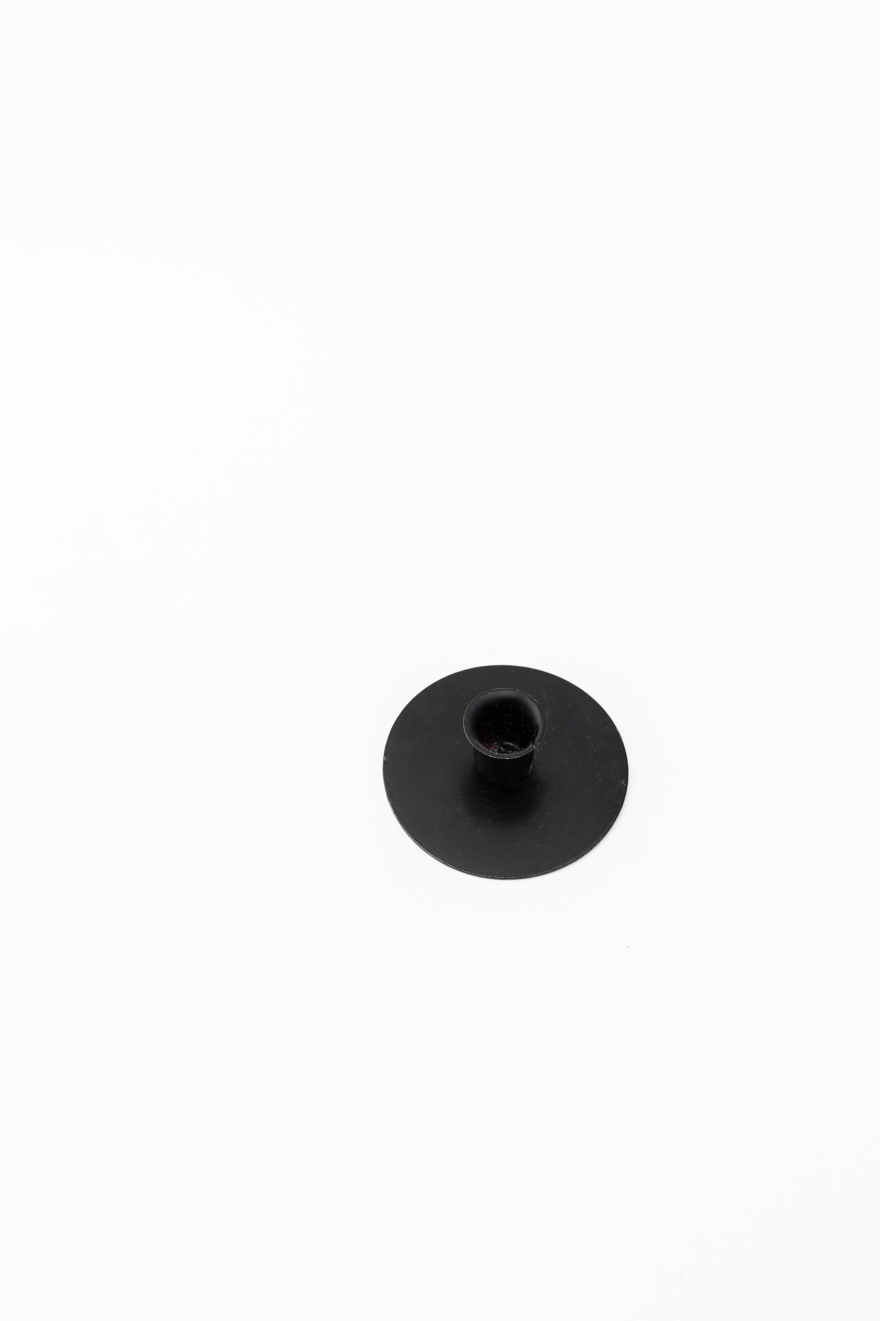 The Candlestick Holder