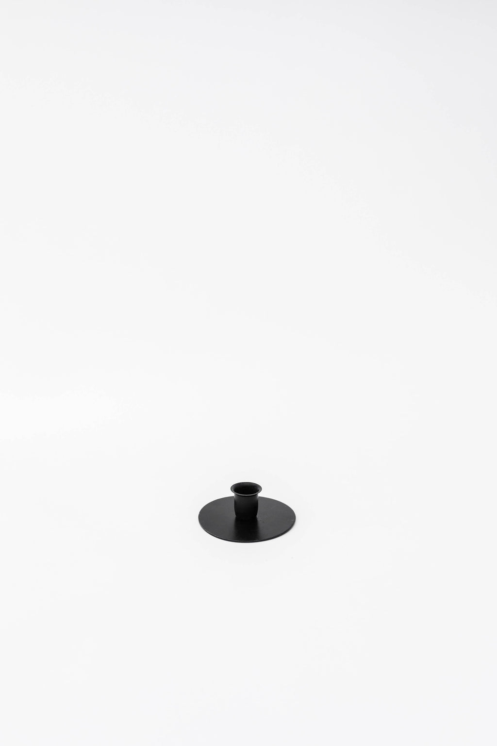 The Candlestick Holder