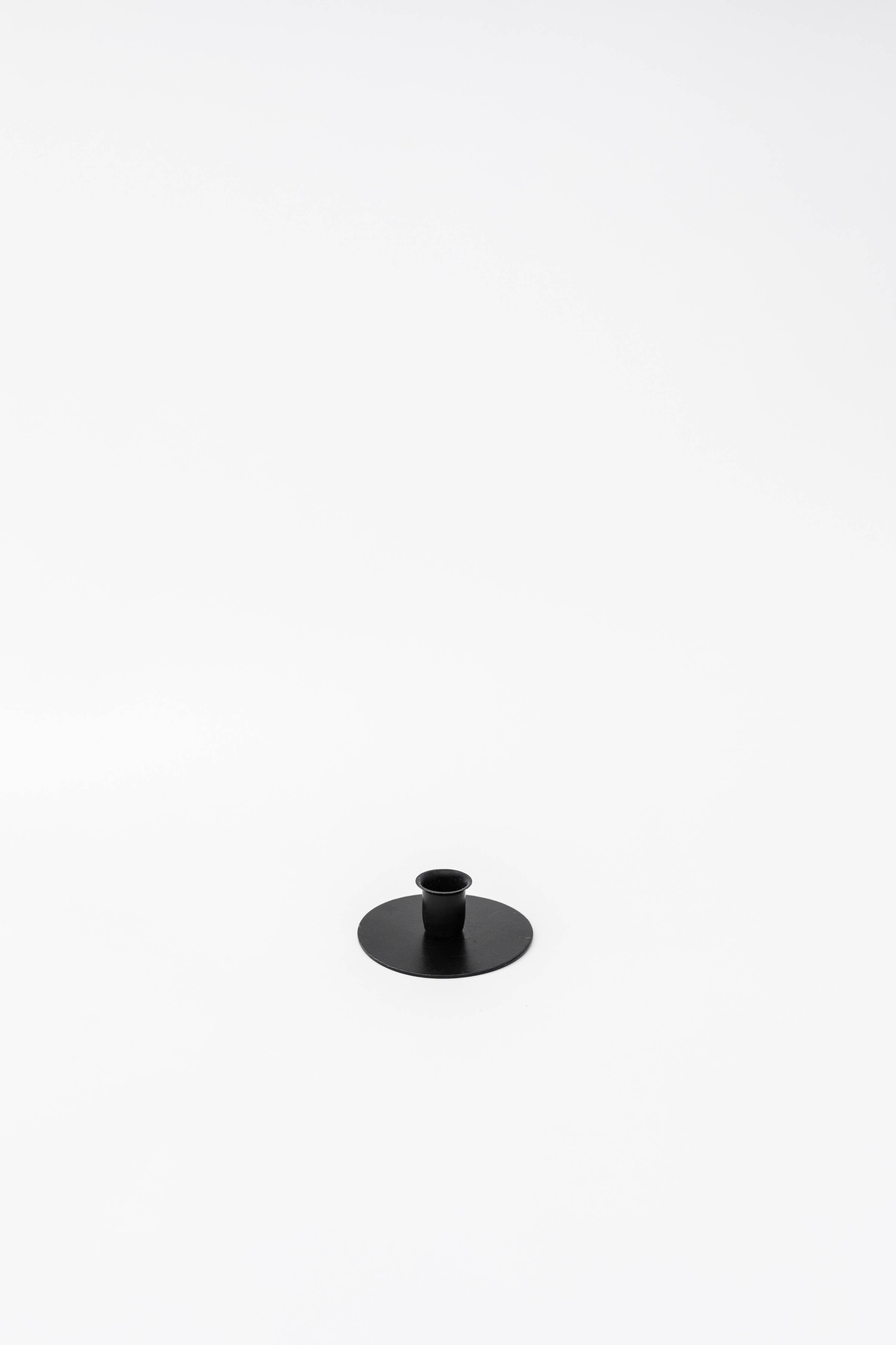The Candlestick Holder