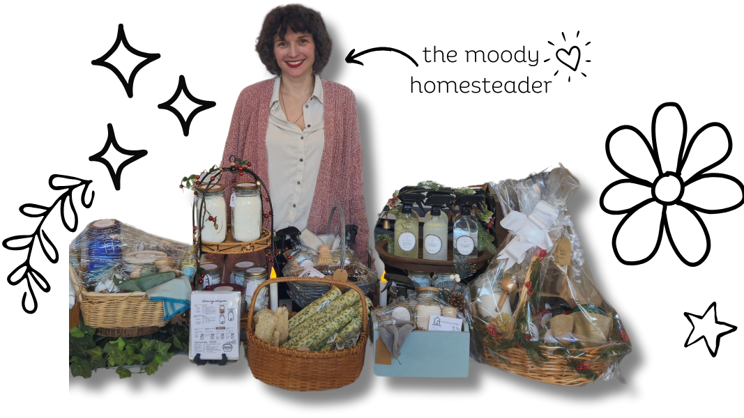 Woman standing behind a display of gift baskets with decorative elements and branding text.